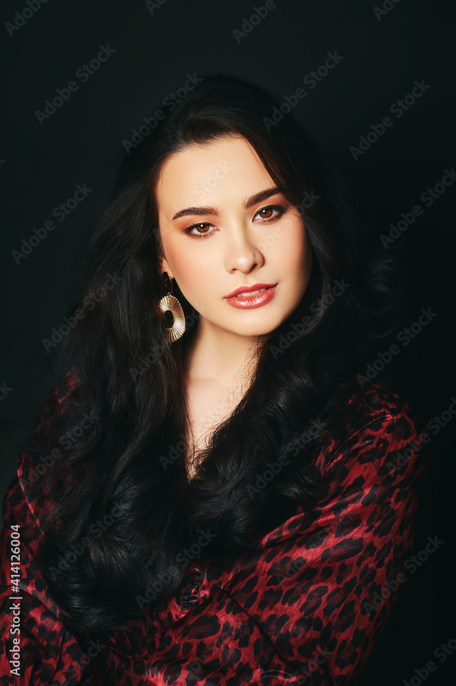 Fashion portrait of beautiful asian woman, professional makeup and hair styling, wearing red leopard print dress