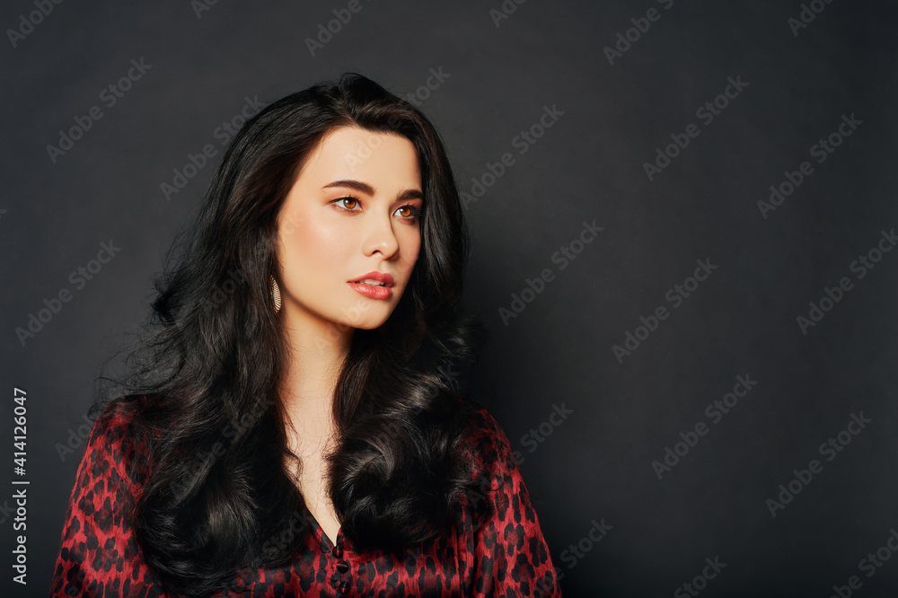 Fashion portrait of beautiful asian woman, professional makeup and hair styling, wearing red leopard print dress Fashion portrait of beautiful asian woman, professional makeup and hair styling, wearing red leopard print dress