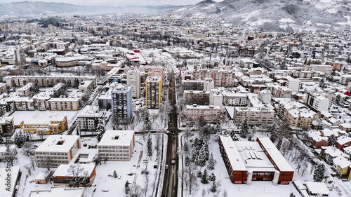 Buildings and streets covered with snow in the winter in Banja Luka, Bosnia and Herzegovina photo