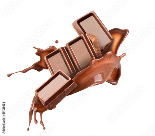 Fotografiet pieces of chocolate with chocolate splash