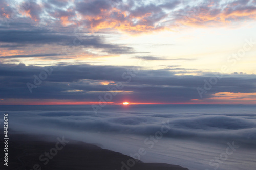 sunset over the clouds