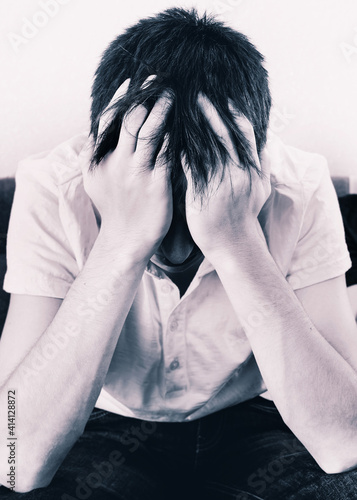 Obraz na płótnie Sad Young Man