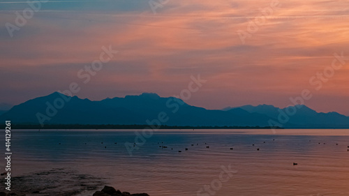 Beautiful sunset with reflections at the famous Chiemsee  Chieming  Bavaria  Germany