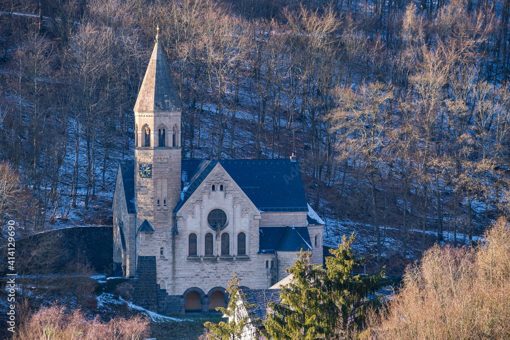 View towards the Christ Church in Schlangenbad / Germany in the Taunus in winter