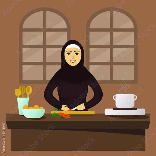 Happy arabic muslim woman with beautiful hijab and traditional emirati  abaya cooking Iftar on the kitchen, dinner for celebration of Holy month Ramadan, people from UAE and Saudi Arabia. Islamic life