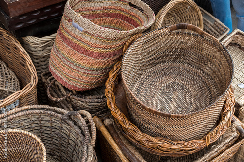 Homemade rattan woven handicrafts for display outside a store at Dapitan Arcade, Quezon City, Philippines. photo