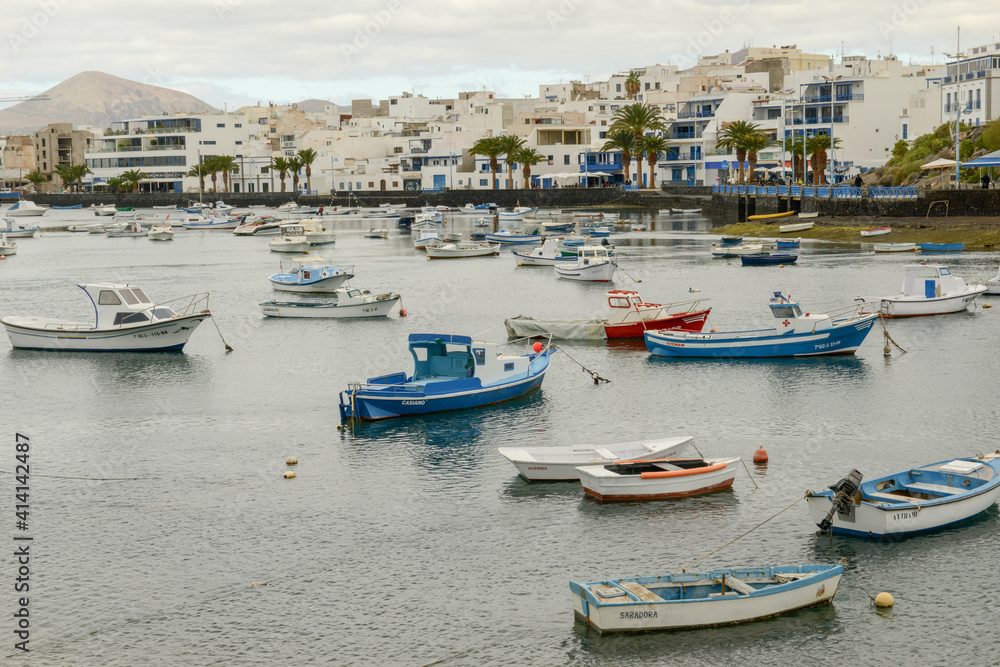 Boats moored at the port of Arrecife on Lanzarote in the Canary Islands, Spain .