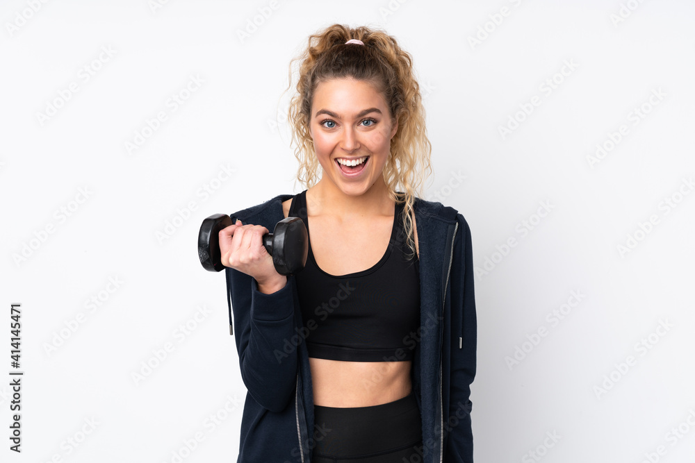 Young sport woman making weightlifting isolated on white background with surprise and shocked facial expression Young sport woman making weightlifting isolated on white background with surprise and shocked facial expression