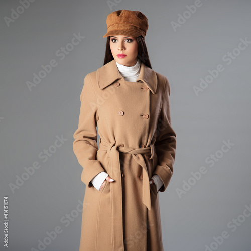Portrait of beautiful young woman wearing a coat