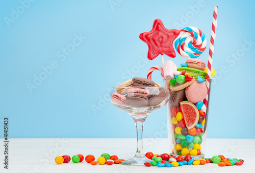 Various sweets in cocktail glasses