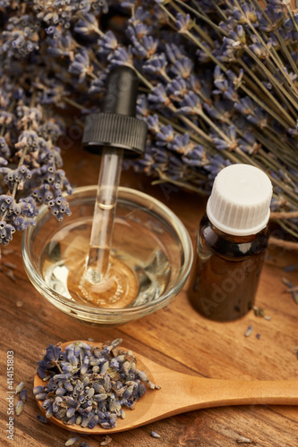 Lavender essential oil and dried flowers © Xalanx
