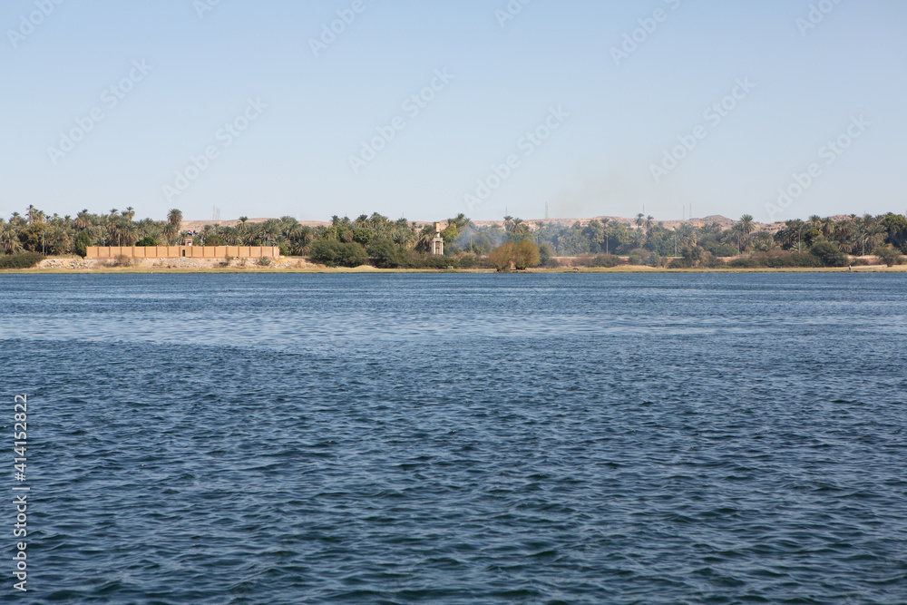 Nile the longest river in Africa. Primary water source of Egypt. Landscape with clear water river.