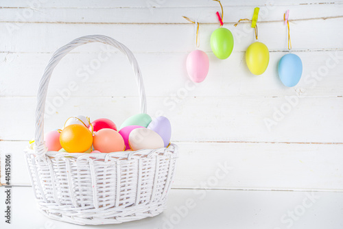 Basket with easter eggs
Basket with easter eggs and spring tulip flowers bouquet. Spring Easter holiday greeting card, invitation background copy space for text
