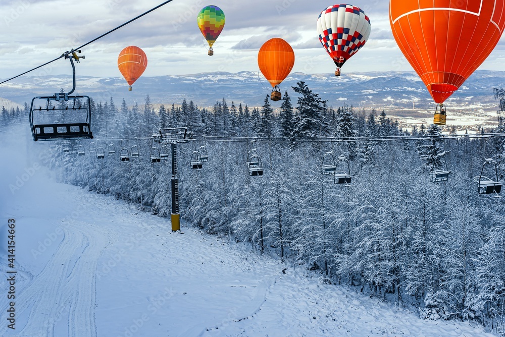 winter holidays in the mountains , cableway . a balloon amid snow in the mountains of Europe. scan from flight altitude.