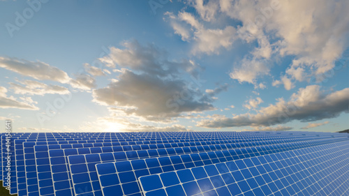 Solar Panels on the Green Fields Under Bright Sun 3d rendering