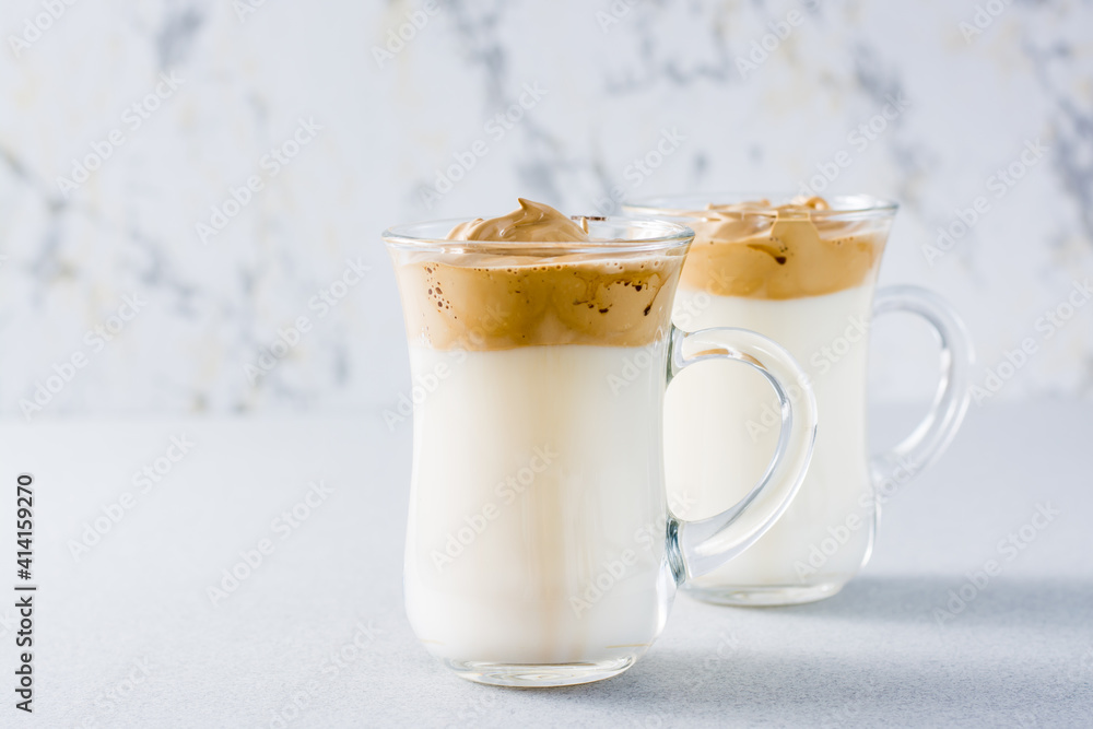 Two cups with dalgona coffee on the table. Quarantine cuisine Two cups with dalgona coffee on the table. Quarantine cuisine