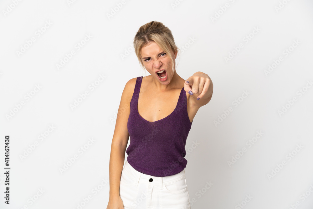 Young Russian woman isolated on white background frustrated and pointing to the front Young Russian woman isolated on white background frustrated and pointing to the front