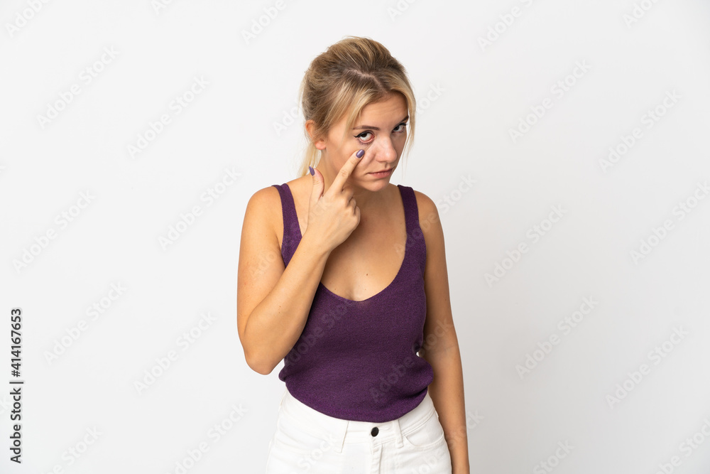 Young Russian woman isolated on white background showing something Young Russian woman isolated on white background showing something