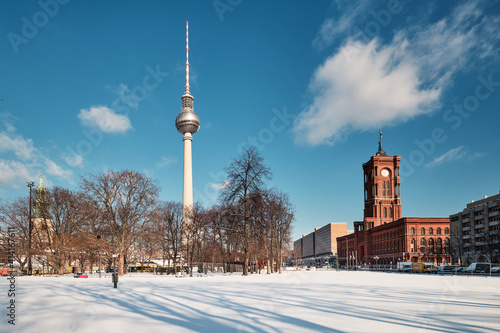 Berlin under snow. Panoramic image with television tower and Red Rathaus, or Old Town Hall in English.