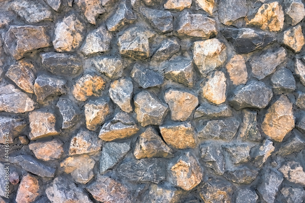 Texture of concrete wall with granite rubble close-up. Texture of concrete wall with granite rubble close-up.