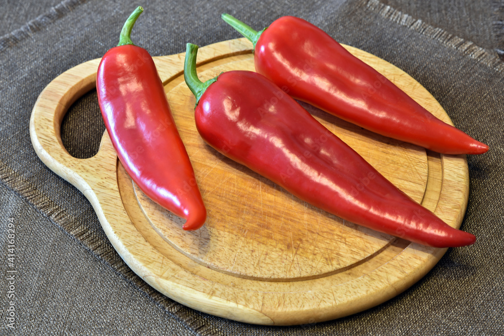 Red hot pepper on a cutting board Red hot pepper on a cutting board