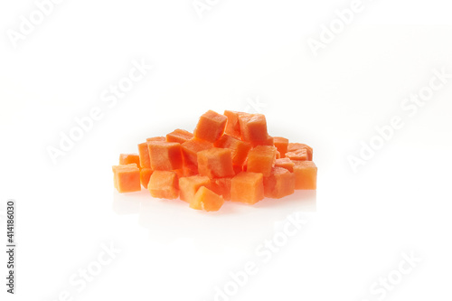 Vegetable boiled cubes on white background