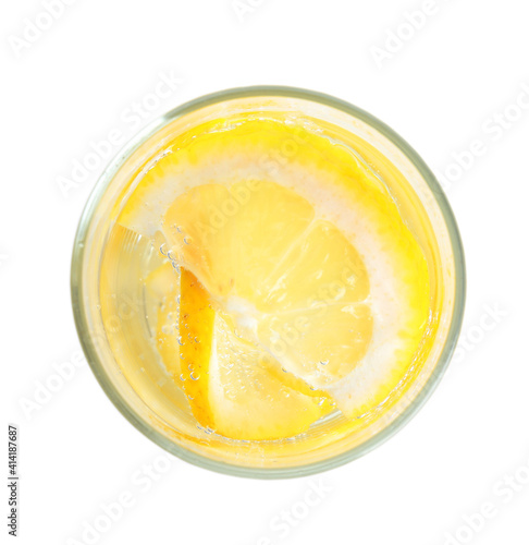 Soda water with lemon slices isolated on white, top view