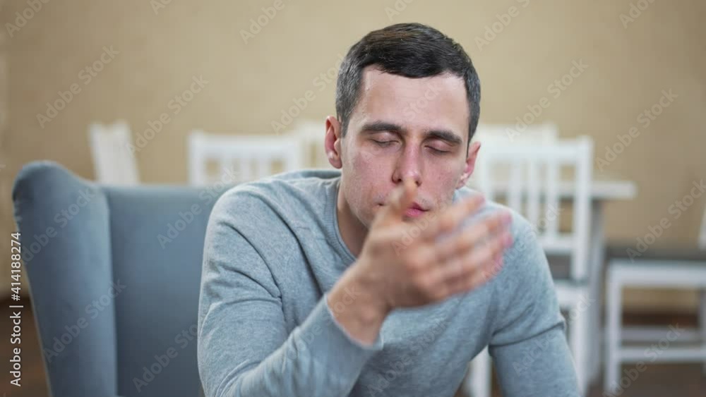 Man do a facepalm at the room Man do a facepalm at the room