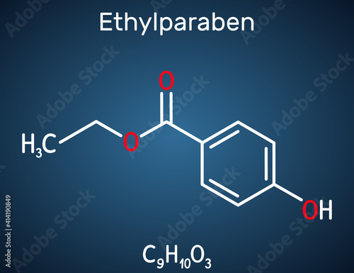 Ethylparaben, ethyl paraben, ethyl para-hydroxybenzoate molecule. It is ethyl ester, paraben, phytoestrogen, antifungal preservative, E214. Dark blue background
