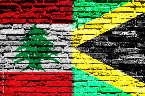 Flag of Lebanon and Jamaica on brick wall