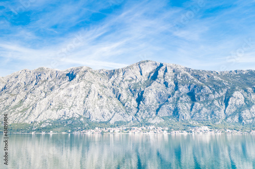 View of Bay of Kotor from the sea surrounded by mountains in Montenegro, one of the most beautiful bay in the world © JPchret