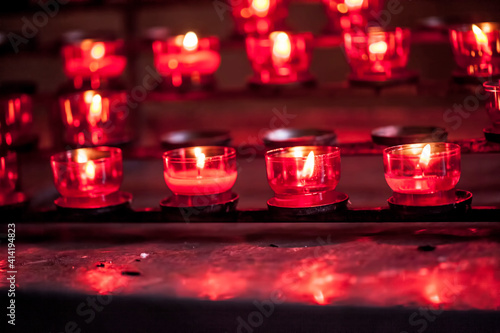 Red Wish Candles in a Christian Church