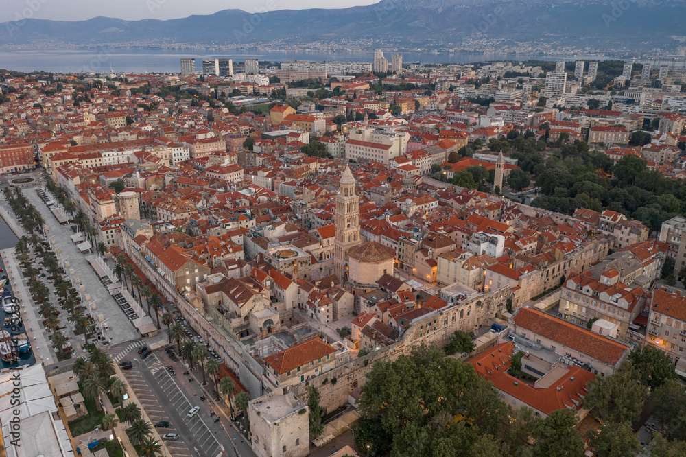 Aerial drone shot of Diocletian Palace in old town split empty riva street befor sunrise in early morning in Croatia