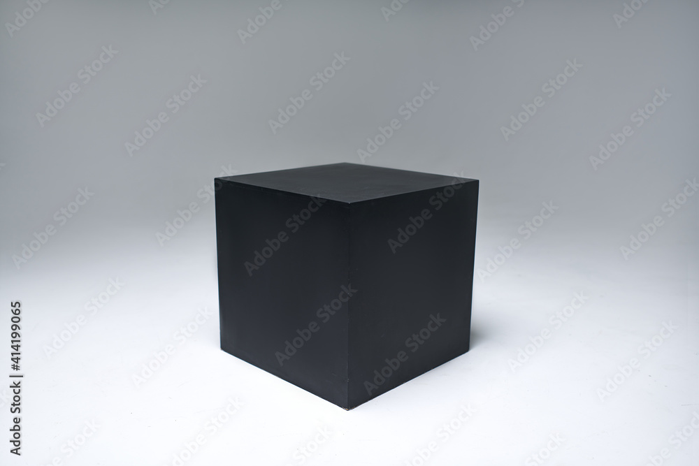 black cube on white background. photo studio equipment. White cyclorama. black cube on white background. photo studio equipment. White cyclorama.