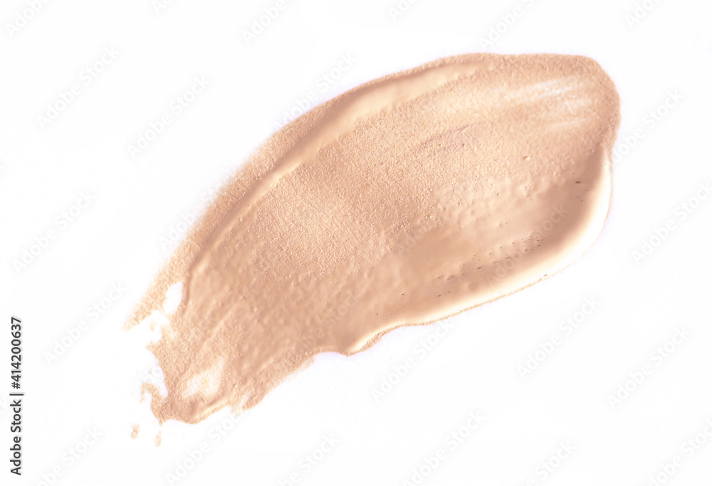 Foundation smear on a white background. A speck of makeup isolated.