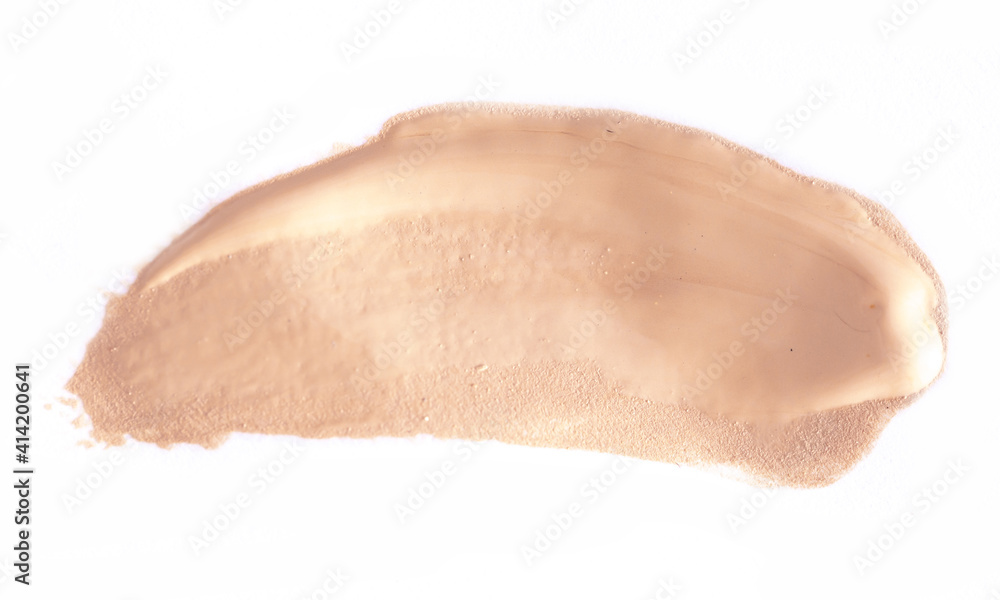 Foundation smear on a white background. A speck of makeup isolated. Foundation smear on a white background. A speck of makeup isolated.