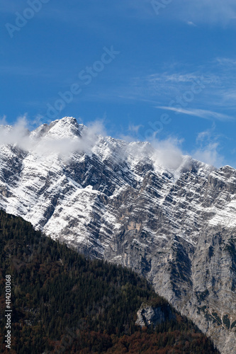 Watzmann mountain detail, snow capped in autumn. View from Obersee. 