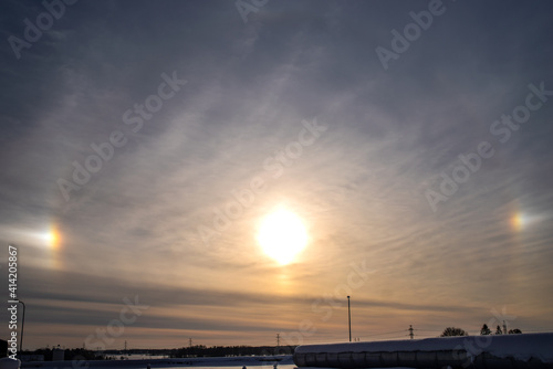 Halo effect in Estonia during a winter morning. Sunny and glittering light. Cold weather. Selective focus.