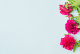 Valentines day composition with red peonies on a light background