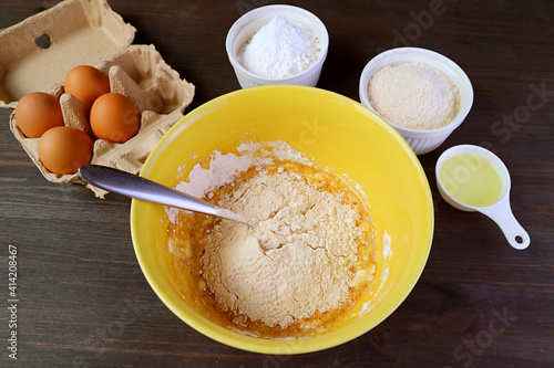 Mixture in Mixing Bowl and with Another Ingredients for Baking Whole Wheat Cake
