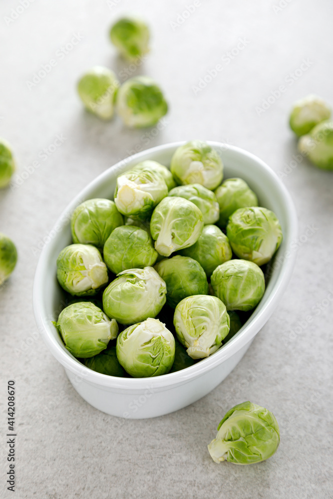 Fresh green brussels sprouts on cooking kitchen table Fresh green brussels sprouts on cooking kitchen table