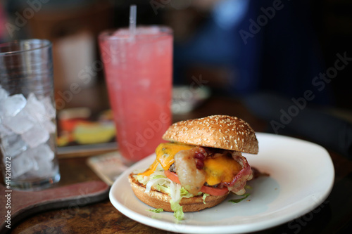 Burger and lemonade on the table