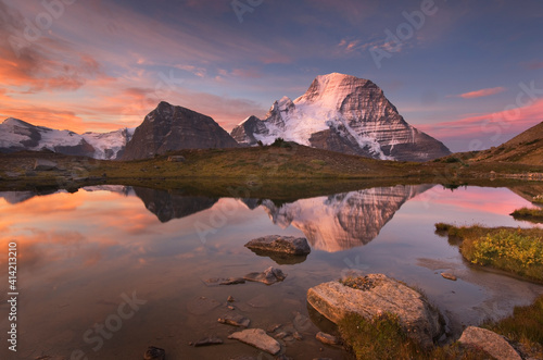 Canada, British Columbia. Sunrise over Mount Robson, highest mountain in the Canadian Rockies, elevation 3,954�m (12,972�ft), seen from Mumm Basin, Mount Robson Provincial Park.