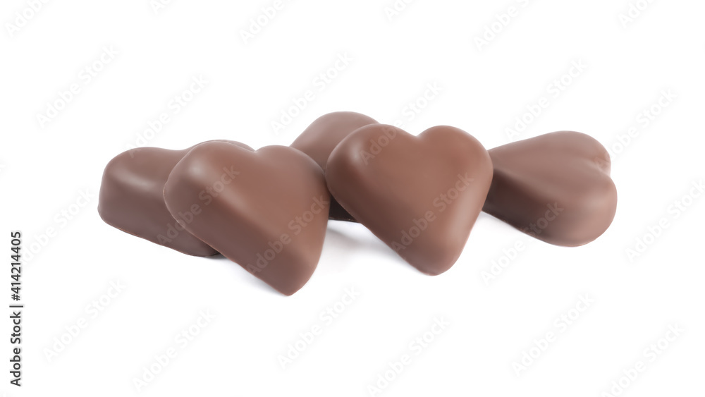 Beautiful heart shaped chocolate candies on white background Beautiful heart shaped chocolate candies on white background