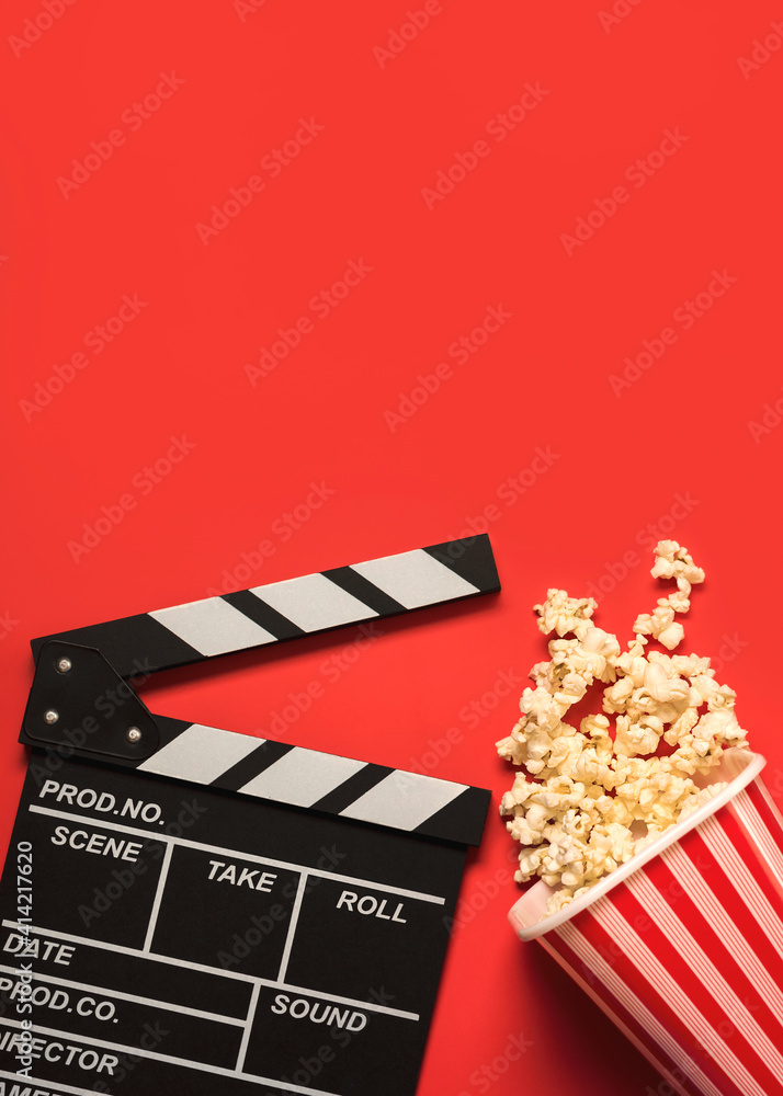 movie clapperboard with popcorn with space for text. Cinema concept background