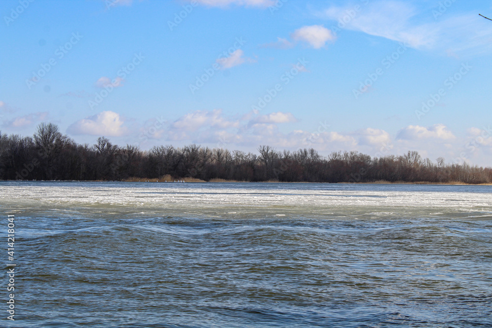 Winter landscape with river and ice