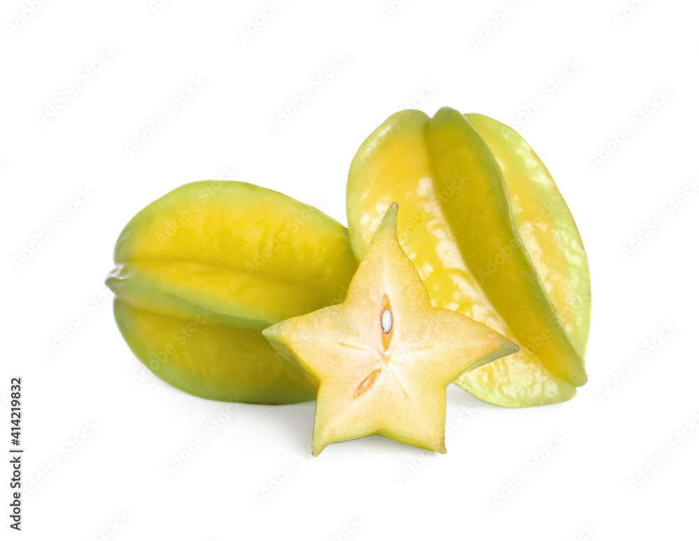 Fototapeta premium Cut and whole carambolas on white background
