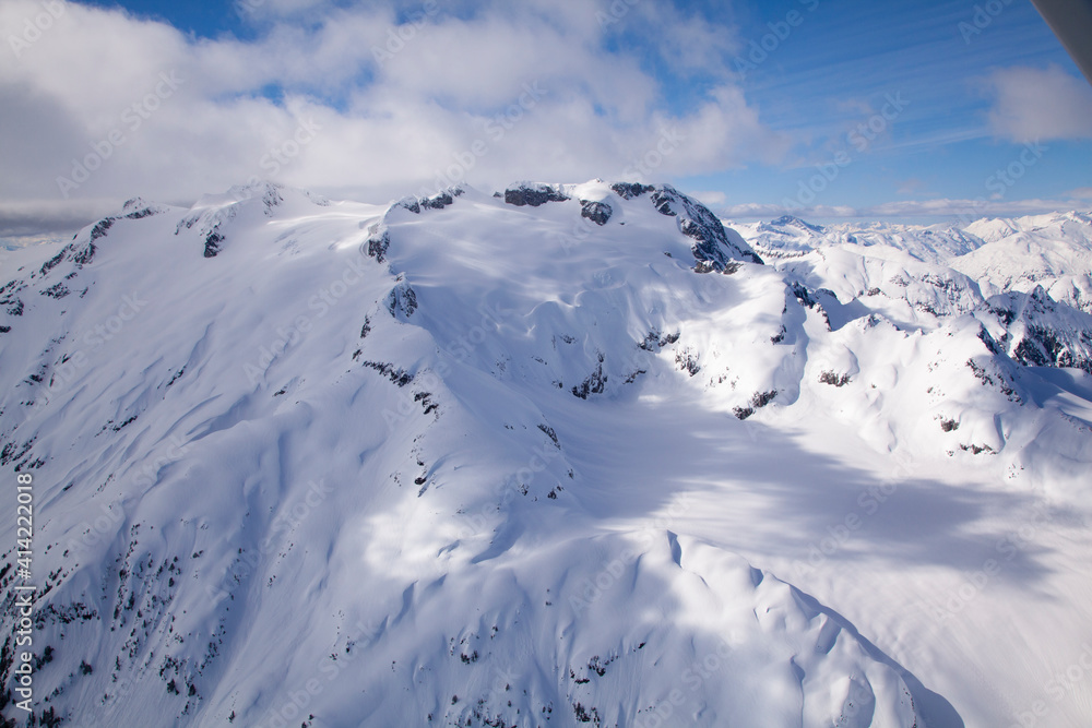 Aerial view of deep snow in the Coast Mountains, near Squamish and Whistler, British Columbia, Canada
