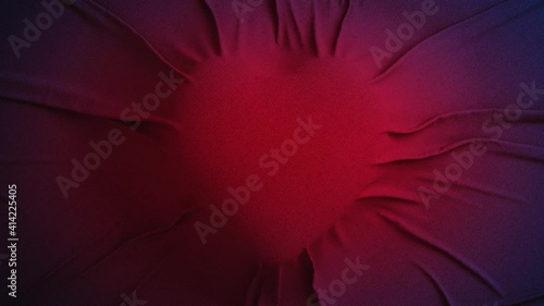 Romantic beating heart animated background - 3D rendering. Seamless loop heart animation made of red fabric with creases. Valentines Day, greeting cards, wedding invitation or birthday e-card.
