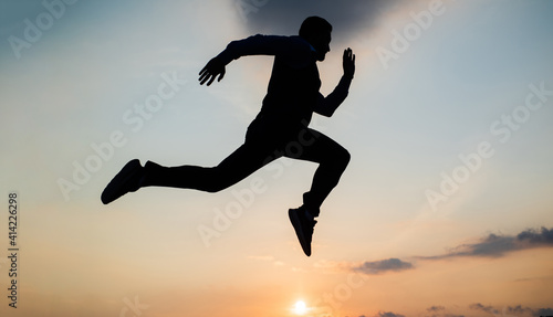 Wallpaper Mural Freedom is not enough. personal achievement goal. man silhouette jump on sky background. confident businessman running. daily motivation. enjoying life and nature. business success. freedom Torontodigital.ca